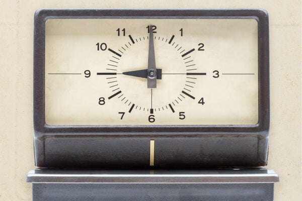Analog time clock isolated on white. Time set to 9 AM.